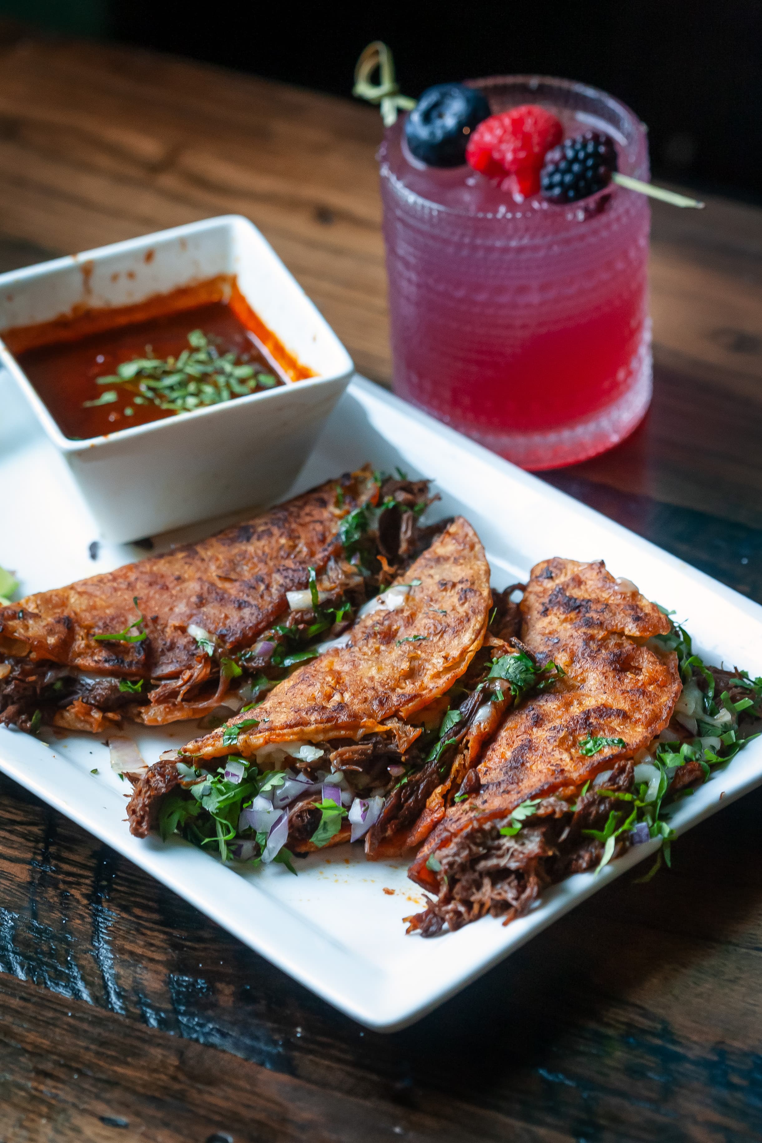 Quesabirria tacos with consomme